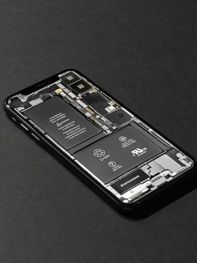 High-resolution image of a smartphone showcasing its internal components on a dark surface.